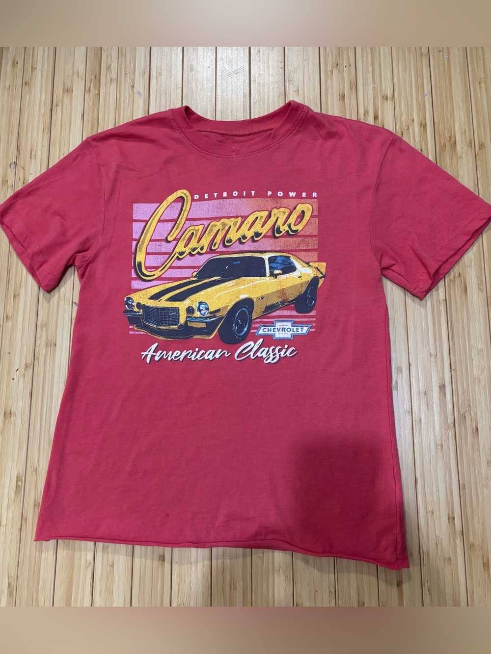 Women’s graphic tee shirt. Size XS. Raw hem.